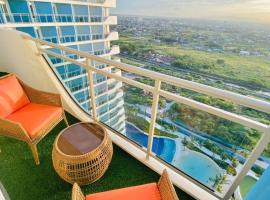 1BR-MonteCarloBliss by The Bali Corner at Azure North, 25th Floor, Full view of Beach Resort Amenities，位于圣费尔南多的酒店