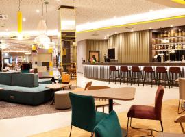 Hampton by Hilton Munich Airport South，位于哈尔伯格摩斯的酒店