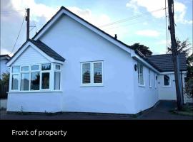 White 3 bed bungalow with en-suite and parking