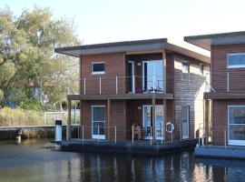 FLOATING HOUSES - "schwimmende Ferienhäuser" - Haus 3，位于巴特的酒店