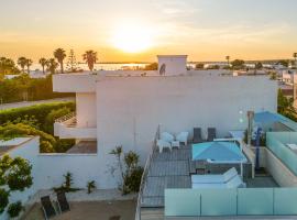 Villa Blumarine e vasca jacuzzi By Cala Salento，位于托雷拉皮罗的酒店