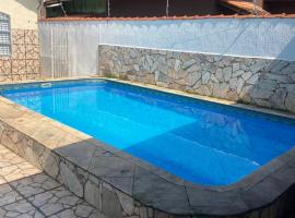 Casa de praia com piscina，位于索莱马的酒店