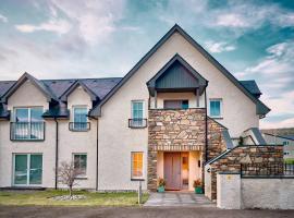 The Steadings, Aviemore Luxury 5 star rated 3 Bed with home cinema garden and parking，位于阿维莫尔的公寓