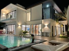 Villa Sapphire9 Aria Vungtau，位于盛日社的高尔夫酒店