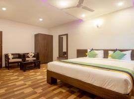 Treebo Elite Plaza, 700 Mtrs From Madikeri Fort，位于马迪凯里的酒店