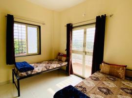 The Peacewood's Homes - Pune's Comfort - Hostel & PG，位于浦那的青旅