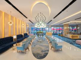 Maani Muscat Hotel & Suites，位于马斯喀特的带按摩浴缸的酒店