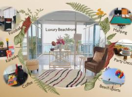 F1E DeOwl Beachfront Balcony Seaview karaoke condo，位于丹绒武雅的公寓