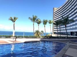 apart hotel 2 quartos frente mar，位于萨尔瓦多的带按摩浴缸的酒店