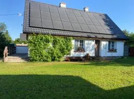 Domek nad jeziorem Bory Tucholskie las jeziora wakacje weekend Błądzim