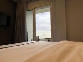 pyramids grand museum inn，位于开罗的酒店