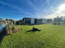 Marina Strandbad Chalet Aan het Strand mit Zaun Haus Nr 133