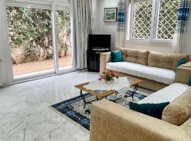 Étage de Villa avec jardin, près de l'aireport et parking privé，位于艾尔亚奈的酒店