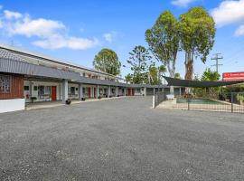 Econo Lodge Chaparral Motel Ballina，位于巴利纳的山林小屋