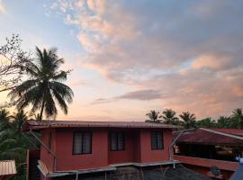 Maison Parnakuti Adigas Homestay Dharmasthala，位于Dharmastala的度假园