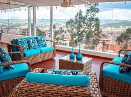 Hermosa casa con lujoso rooftop en Cuenca，位于昆卡的酒店