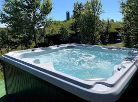 Bjørnebuhytten, Geilo, 13 sengeplasser med privat Jacuzzi og el-bil-lading，位于耶卢的酒店