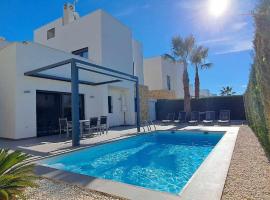 Modern Villa in Costa Blanca with private pool, garden and parking - ALL COSTS INCLUDED，位于罗哈莱斯的别墅