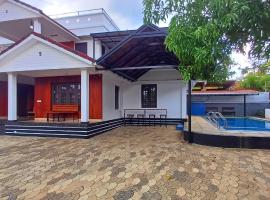 Empire Pool Villa，位于米南加迪的家庭/亲子酒店