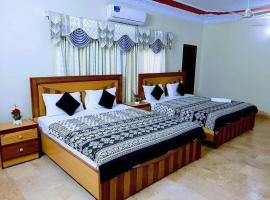 Galaxy Inn Guest House，位于卡拉奇Gulshan-E-Jamal的酒店