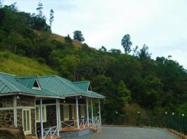 Vagamon 4 large family Rooms & 20 bunk beds apartment 812'983'5682，位于瓦加蒙的酒店