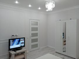 1-но комнатная квартира в центре Нур-Султана ЖК Sezim Qala 4 рядом с Барыс Ареной，位于阿斯塔纳的公寓
