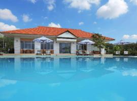 Maxivic Beach Resort Phan Thiet，位于潘切的山林小屋