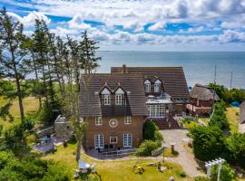 Huus Lüttenblick Ferienhaus Seepferdchen，位于Südstrand的酒店