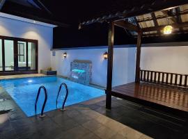 Najazi Villa，位于士兆的带泳池的酒店