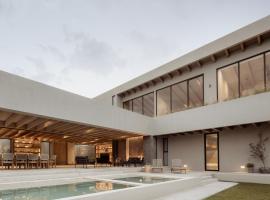 Casa Pirules. Moderna y comoda casa con alberca caliente en club de golf!，位于Tepeji de Ocampo的酒店