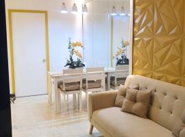 white room 2BR condo in banilad cebu，位于曼达维市的酒店