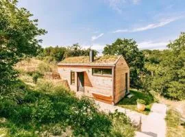 Tinyhouse Minimalus Panorama Schlafloft im Grünen