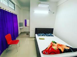 Hotel Abhinov，位于迪布鲁加尔的酒店