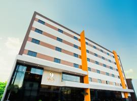 Megal Suites Hotel，位于埃斯特城Guarani International Airport - AGT附近的酒店