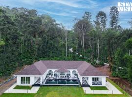 Stayvista at Mudra Manor 4BR - Coffee Estate Comp Breakfast Big Heated Pool，位于马迪凯里的自助式住宿