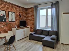 Konopnickiej 9 Apartament Loft dostęp na kod, Ptak, Orientarium, Atlas ARENA, Szpital, Mandoria, Fala, Centrum Zdrowia Matki Polki, Rodzina, Family, bezpłatny parking，位于帕比亚尼采的酒店