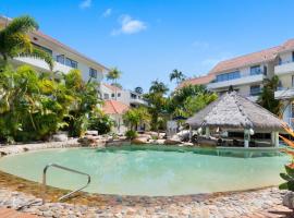 努沙国际公寓式度假酒店，位于努萨角的酒店