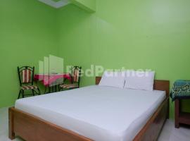 Wisma Giri Mulyo B near Grojogan Sewu Mitra RedDoorz，位于塔旺曼谷的酒店