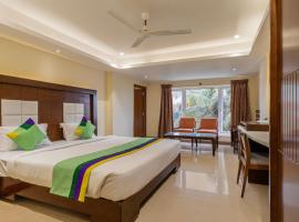 Treebo Trend Suvarna Comforts，位于哈桑的酒店