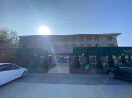 SHARQ HOTEL，位于Oktyabrʼ的酒店