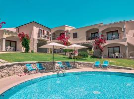Residence con piscina a Badesi, appartamenti con WIFI e A.C，位于巴德希的酒店