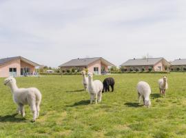B&uuml;dlfarm - Der Familien-Erlebnishof in Strandn&auml;he，位于费马恩的高尔夫酒店