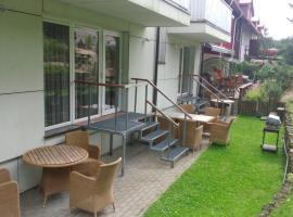 罗马风格公寓酒店，位于奈达的酒店