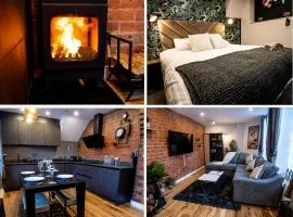 VIP - 2 BR Grade 2 Luxury Industrial House with Log Burning FIRE & electric blinds in the Heart of the JQ