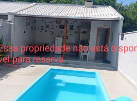 Casa c/ piscina próximo a praia do Grant Itajuba，位于巴拉韦利亚的酒店