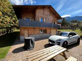 Chalet Bel-Air A due passi dalle piste, con giardino e posto auto，位于泰穆的木屋