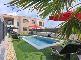 Villa Tri Palme with heated pool