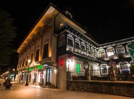 布切吉酒店，位于锡纳亚的酒店