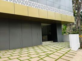 Cocobay inn by Capella Global，位于Chakkarakkal的酒店