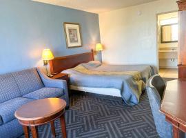 Super Inn & Suites by OYO Milledgeville，位于米利奇维尔的酒店